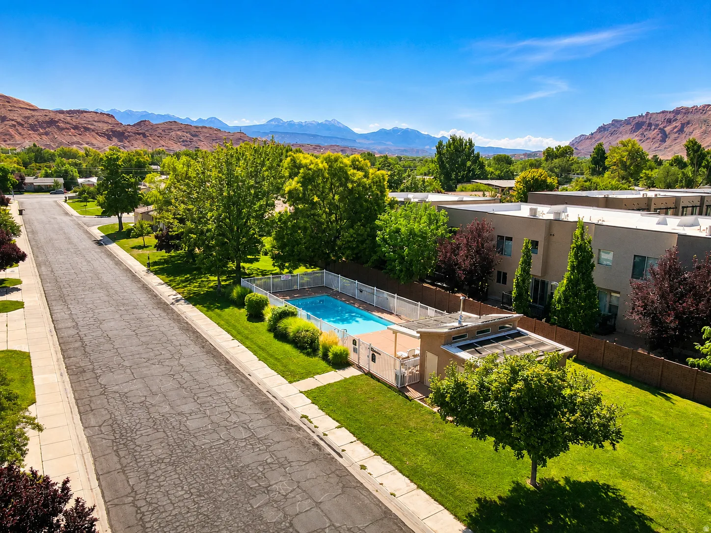 Community swimming pool with surrounding fencing