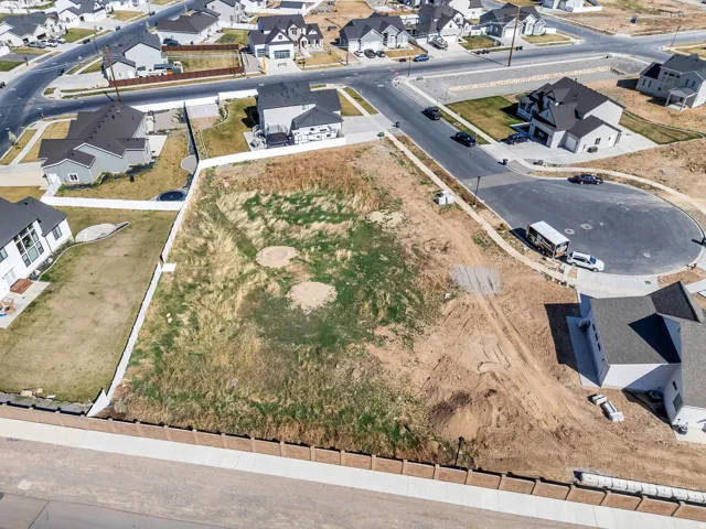 Expansive undeveloped lot with partial fencing