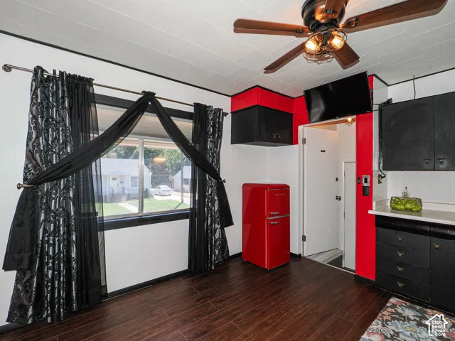 Wood-finish flooring throughout and a good sized picture window.