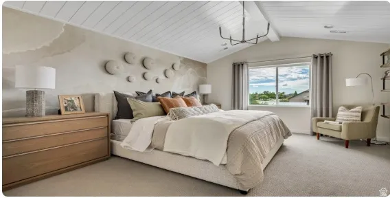 Vaulted ceiling with exposed beams and a contemporary chandelier. Home is TO BE BUILT. Pictures are of a similar model.