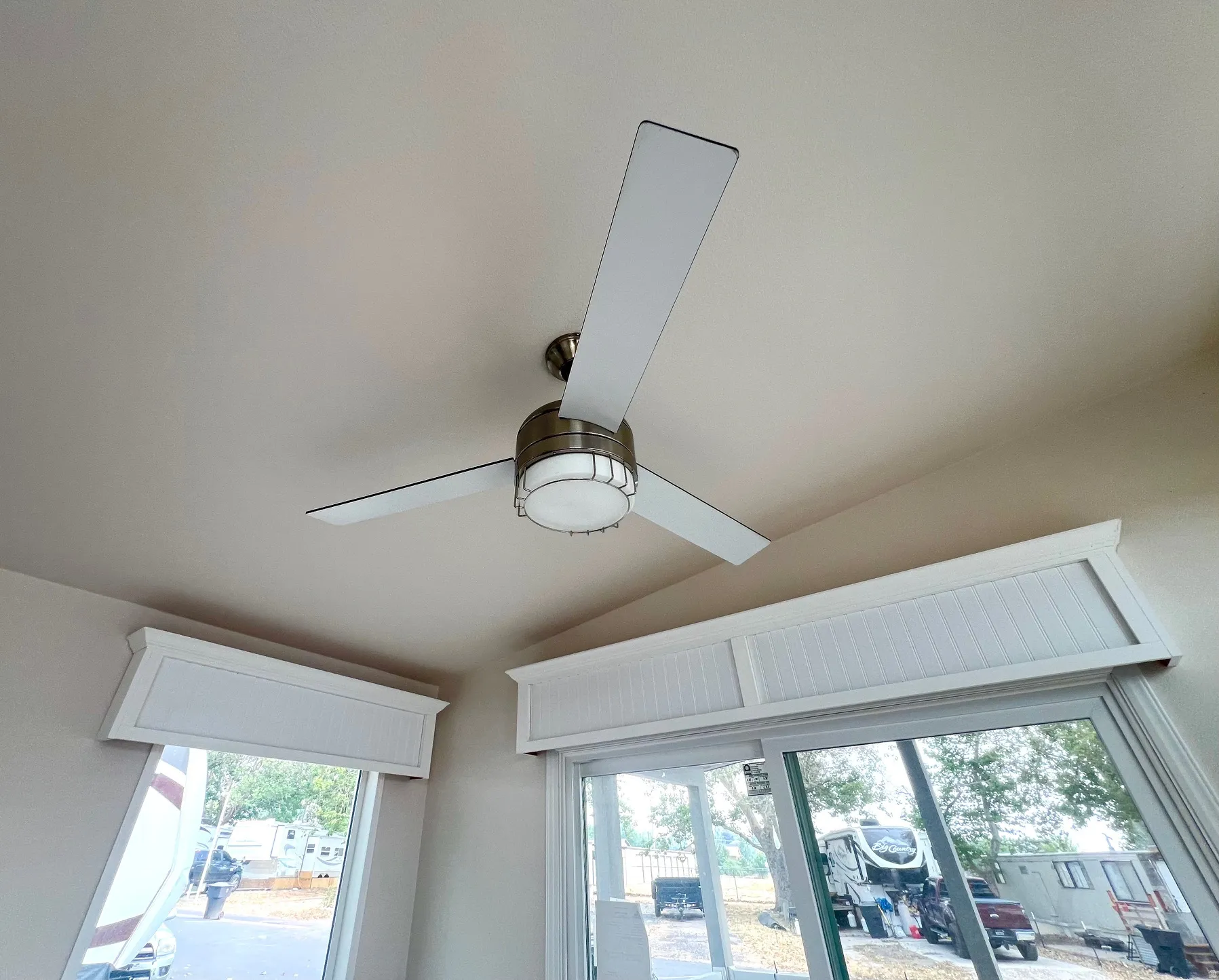 Brushed nickel ceiling fan with integrated lighting fixture