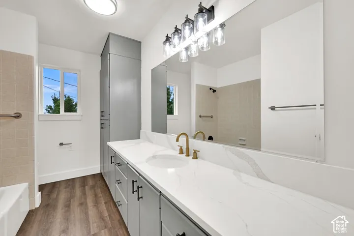 Double vanity with white countertop and integrated sinks
