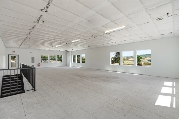 So many Possibilities for Office and Living Space. Owner added 6 additional windows to capture all the views