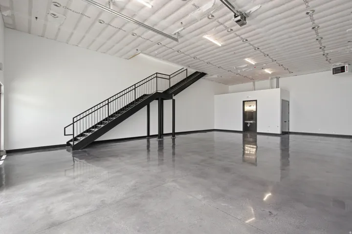 Awesome Stained Concrete Floor, Finish Electrical, Insulation, Painted Staircase and Drywall Finished and Painted.