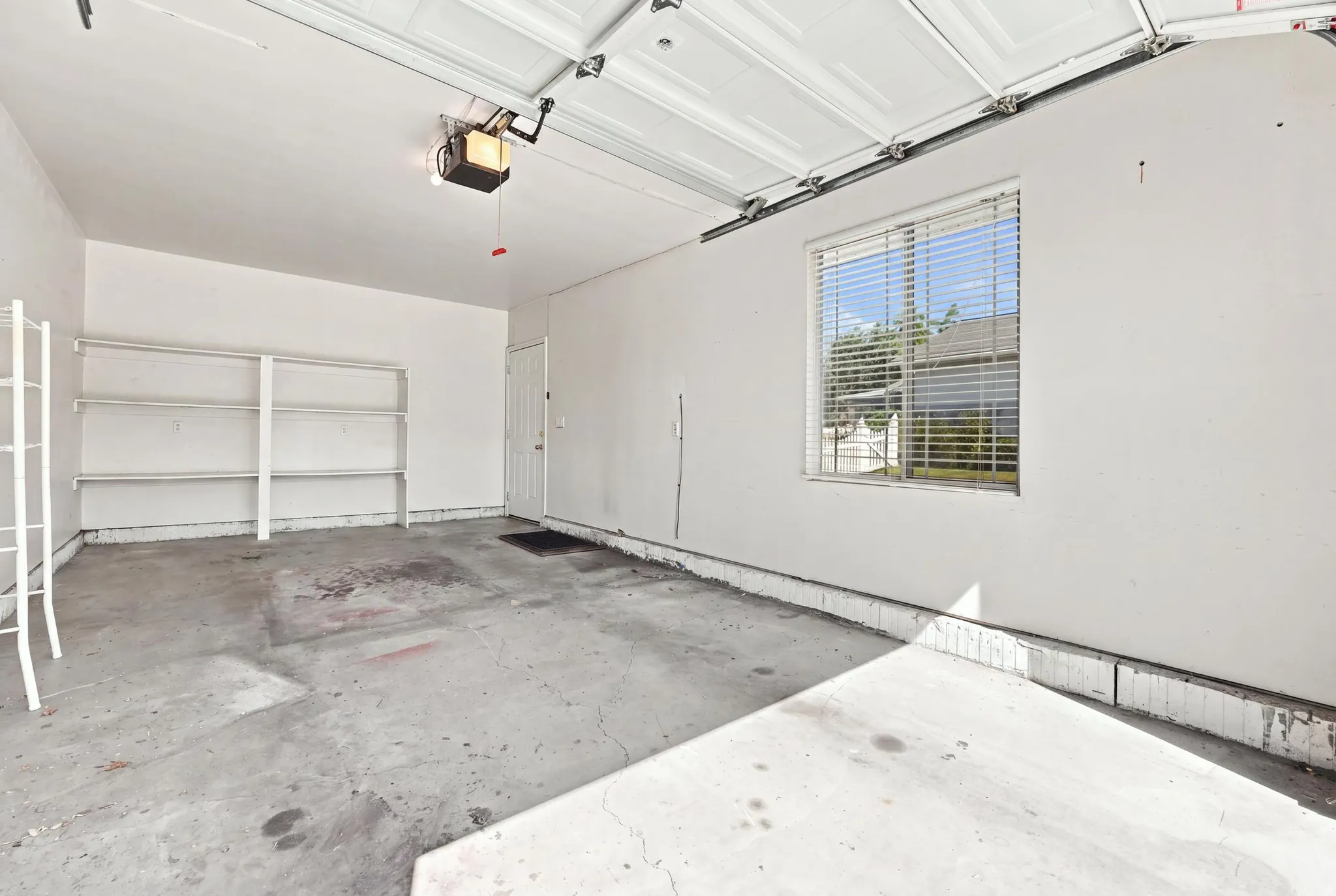 1 car garage with shelves