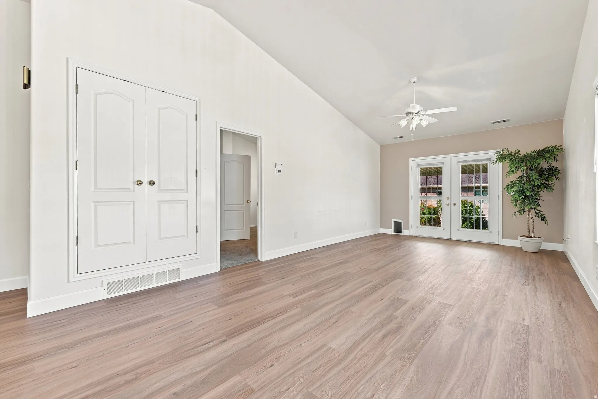 dining looking into Master Room, living room and outside covered Patio
