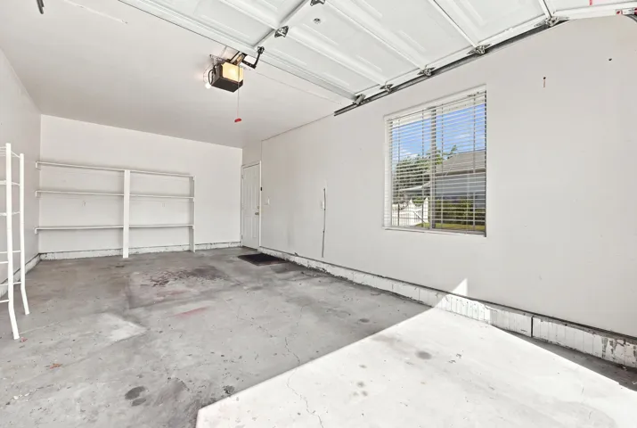 1 car garage with shelves