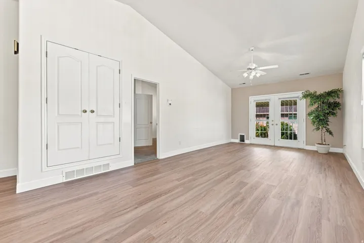 dining looking into Master Room, living room and outside covered Patio