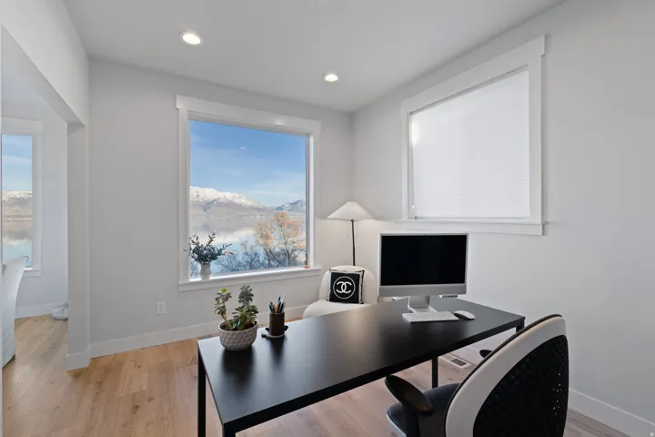 Bright interior space with light wood-finish flooring