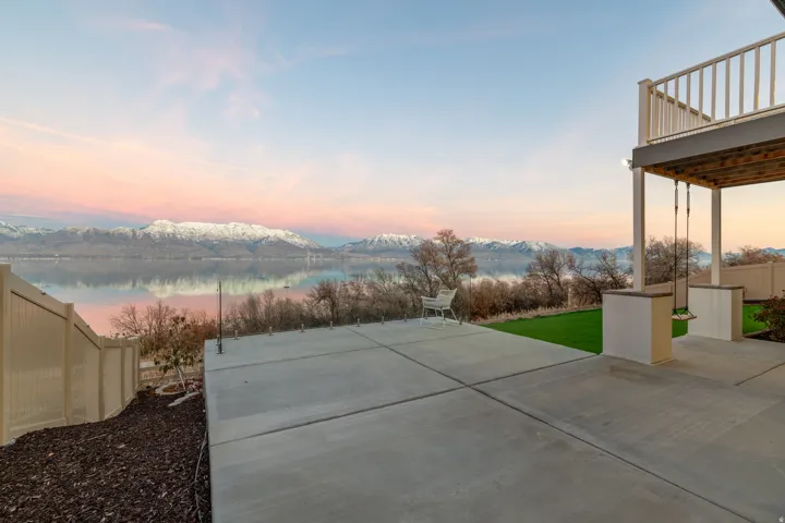 Concrete patio with direct lake access