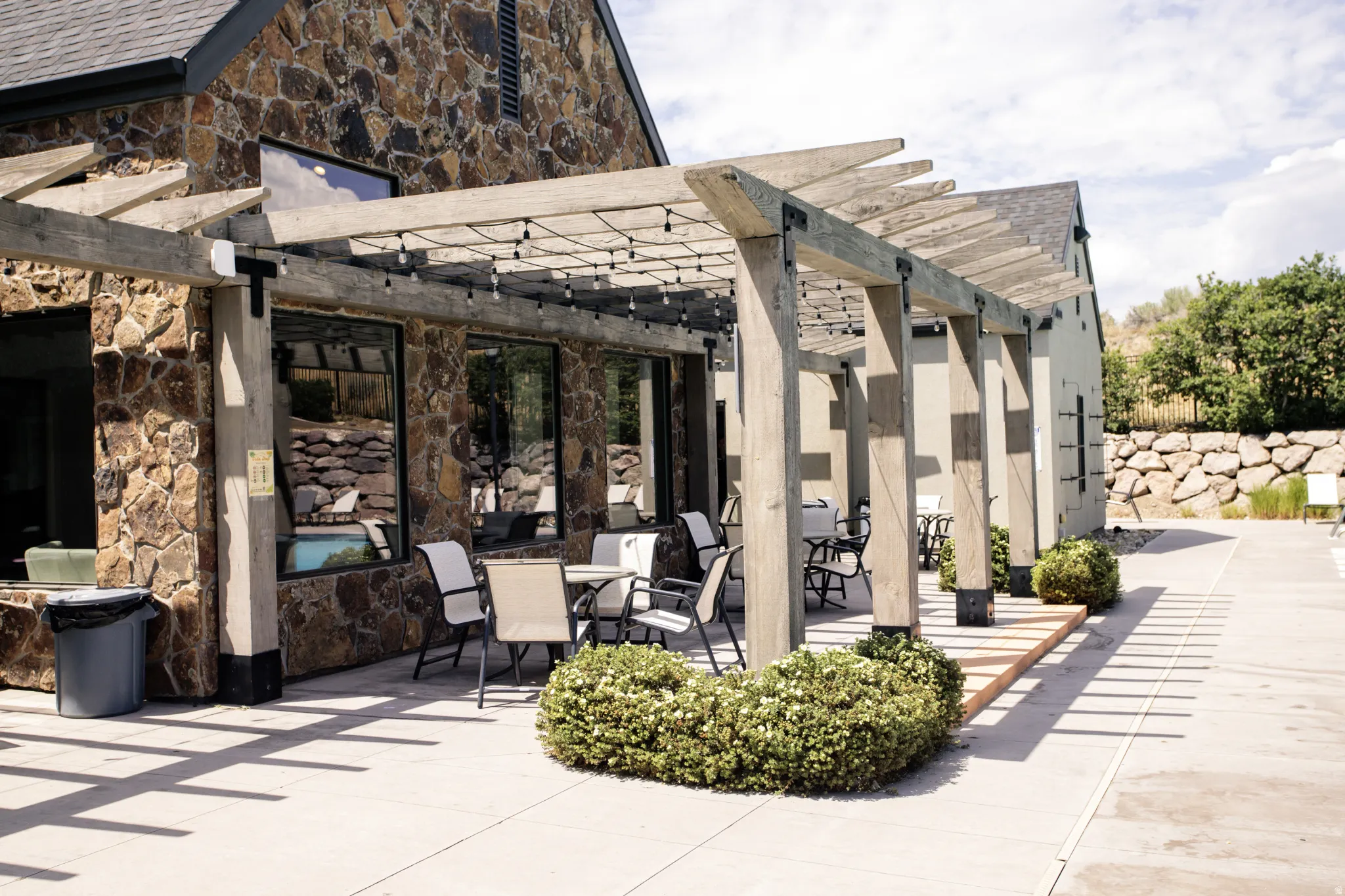 Relax and enjoy the expansive patio by the pool.