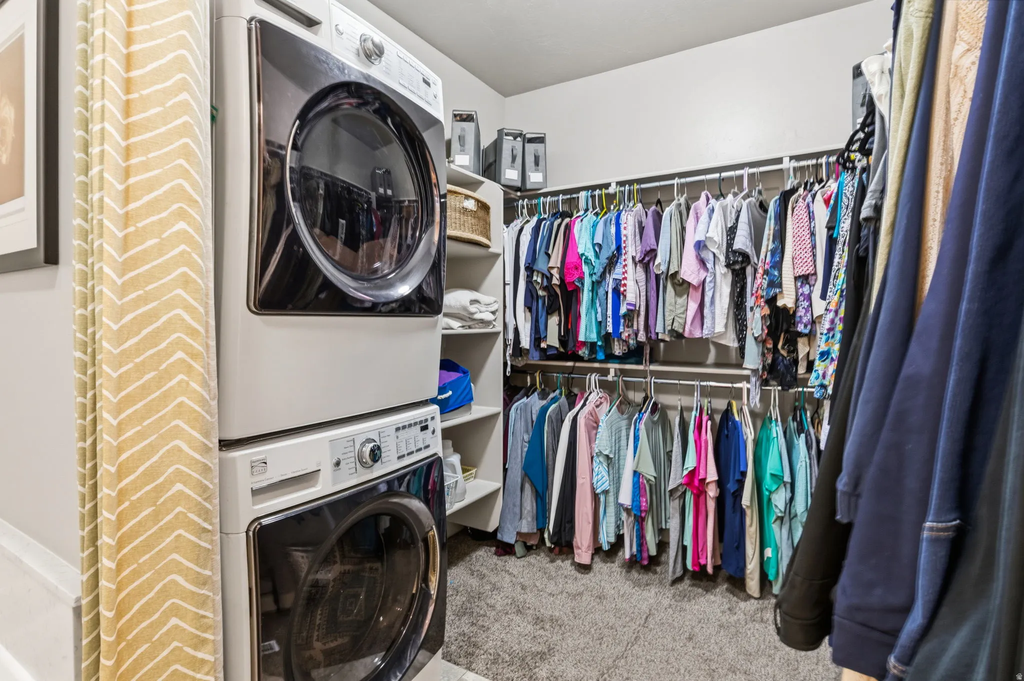 TALK ABOUT CONVENIENCE!  You will LOVE having your Integrated laundry area with stacked appliances.  Custom shelving and LOTS of room for all your wardrobe needs!!!