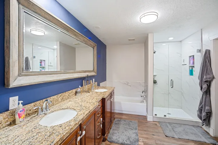 Double vanity with granite countertop and integrated sinks