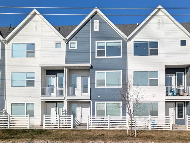 Modern facade with white and blue siding