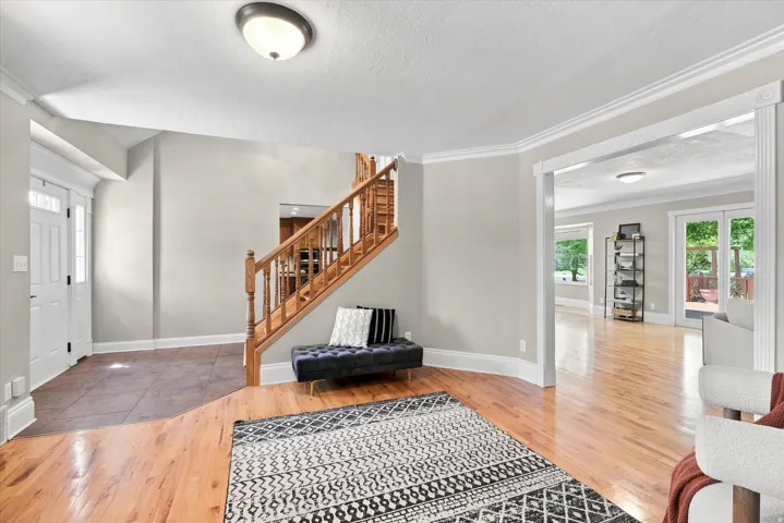Hardwood flooring extending throughout the main living areas