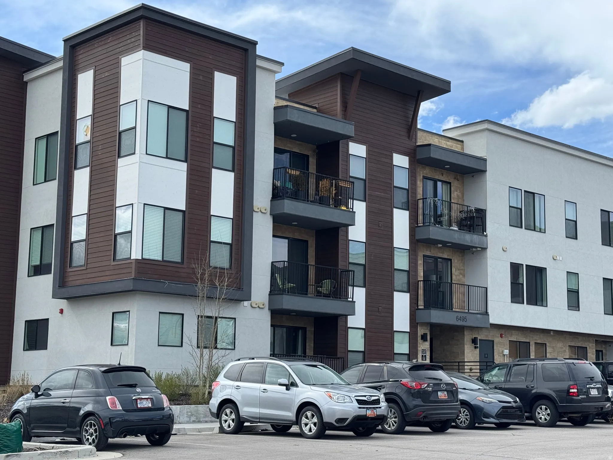 Multi-story residential building featuring a contemporary facade