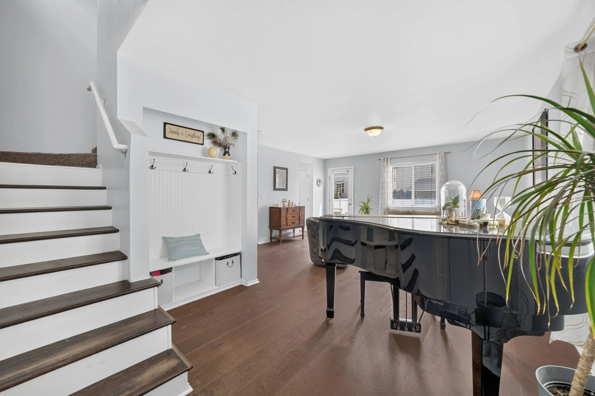 Main living space featuring wood-finish flooring and light-toned wall paint