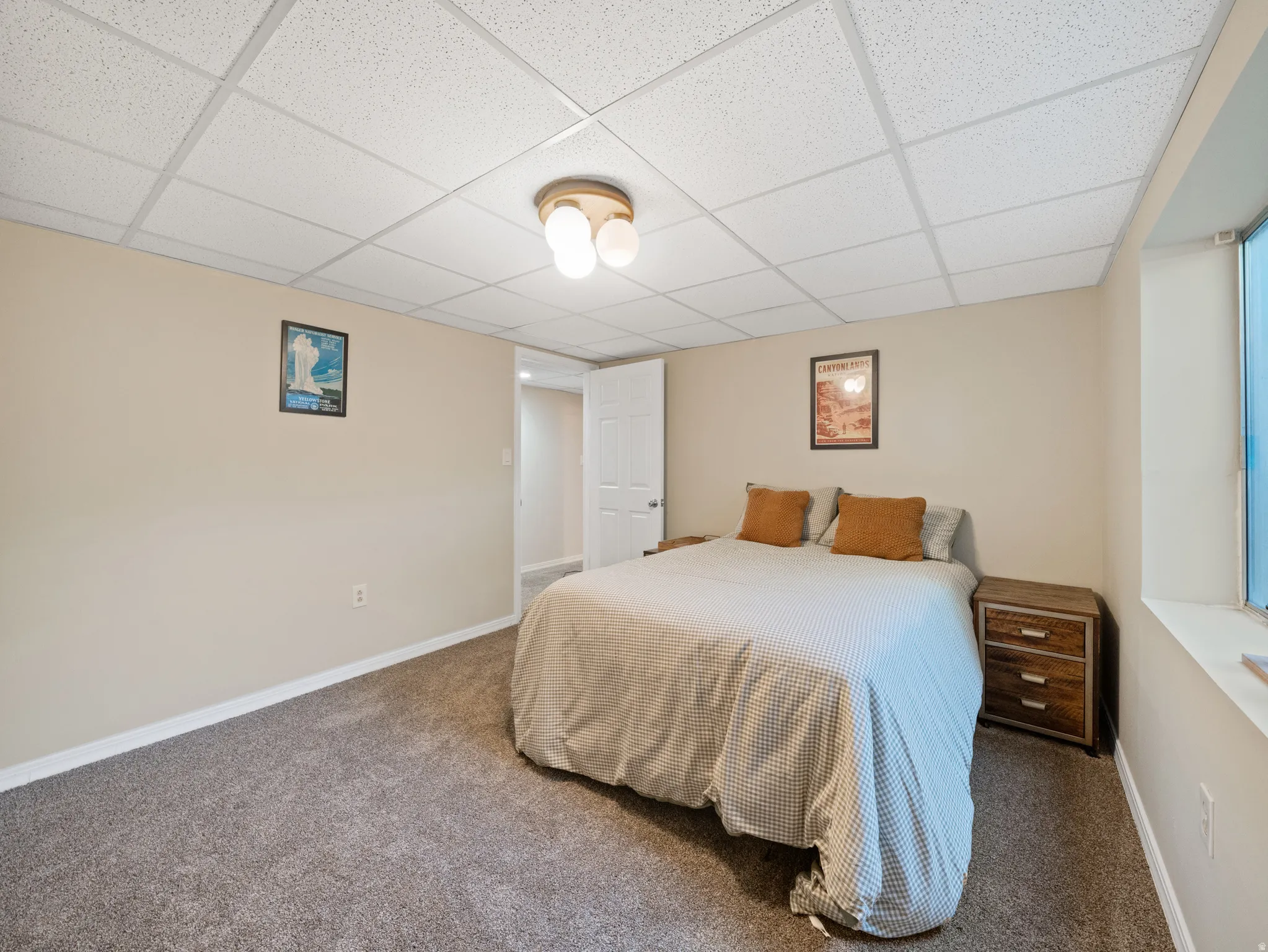 Bedroom featuring neutral-toned walls, recessed lighting, and grey carpet flooring