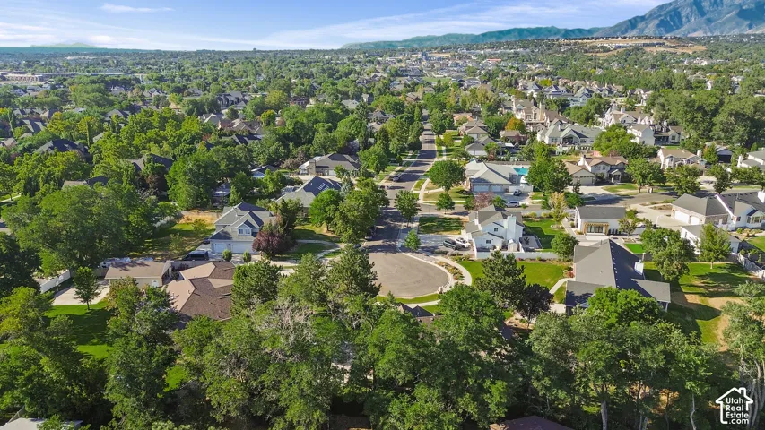 Residential neighborhood featuring mature trees and a cul-de-sac