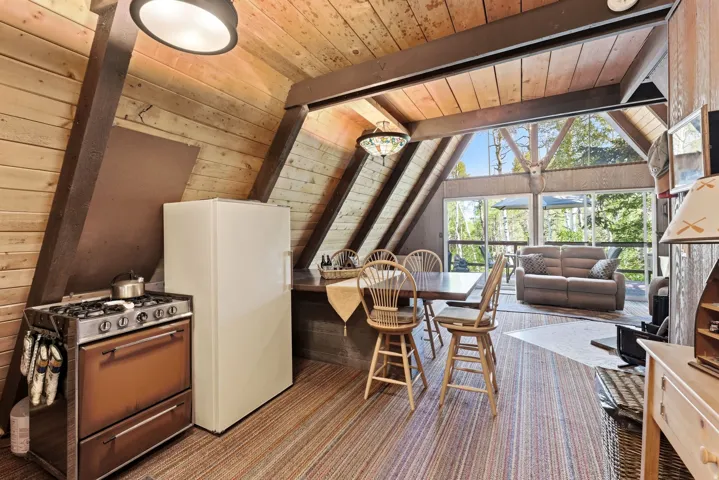 Vaulted wood-paneled ceilings with exposed beams