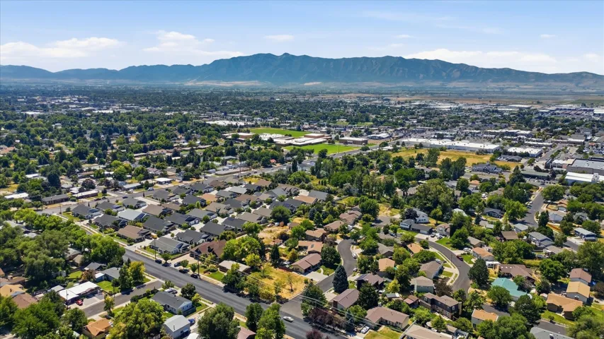 Expansive neighborhood featuring numerous residential properties and mature tree coverage