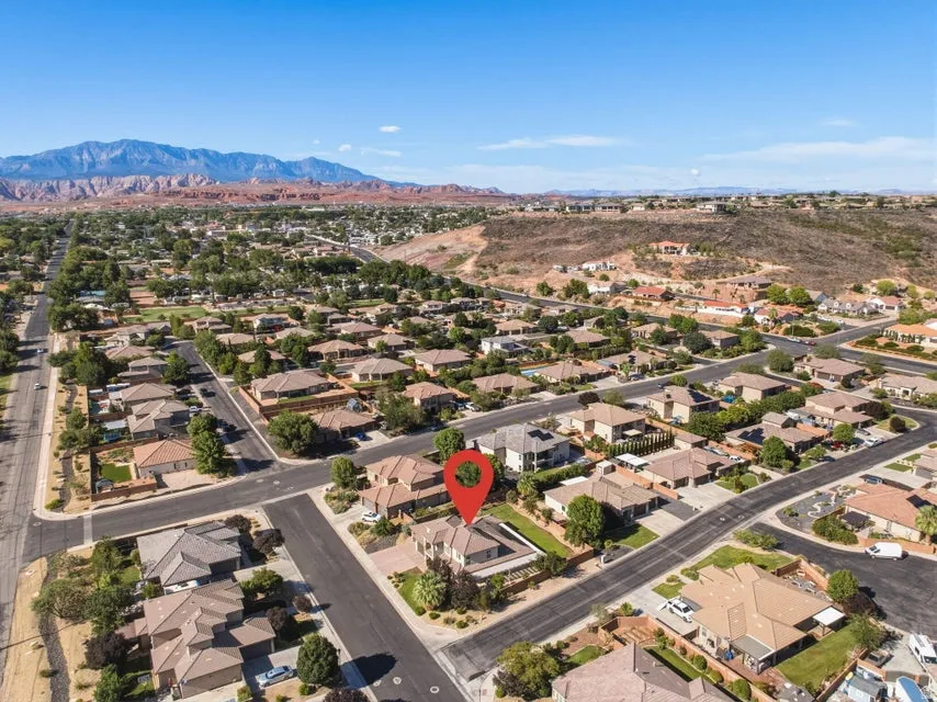 Aerial view showcasing this residence positioned within a well-established suburban community