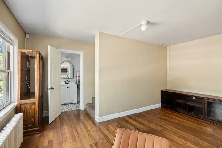Hardwood-style flooring throughout the main room