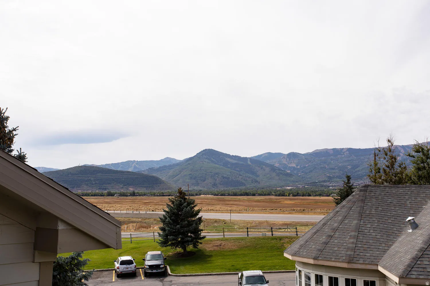 Stunning mountain and valley vistas frame this elevated residential setting