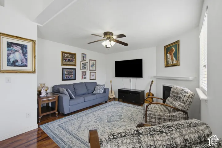 Bright and spacious living room featuring bamboo flooring, and a fireplace