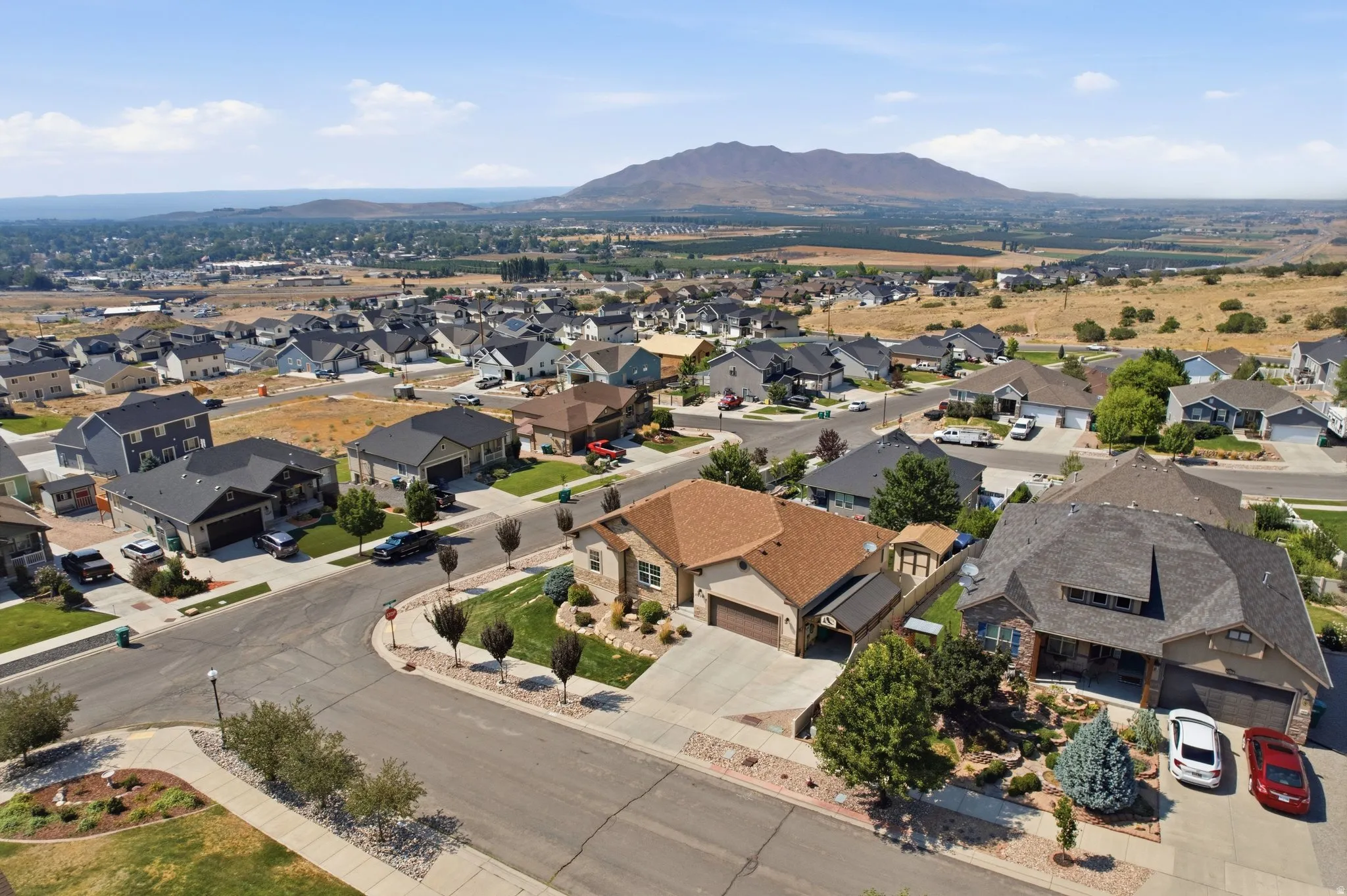 Elevated aerial perspective showcasing this residential property situated within a well-established community