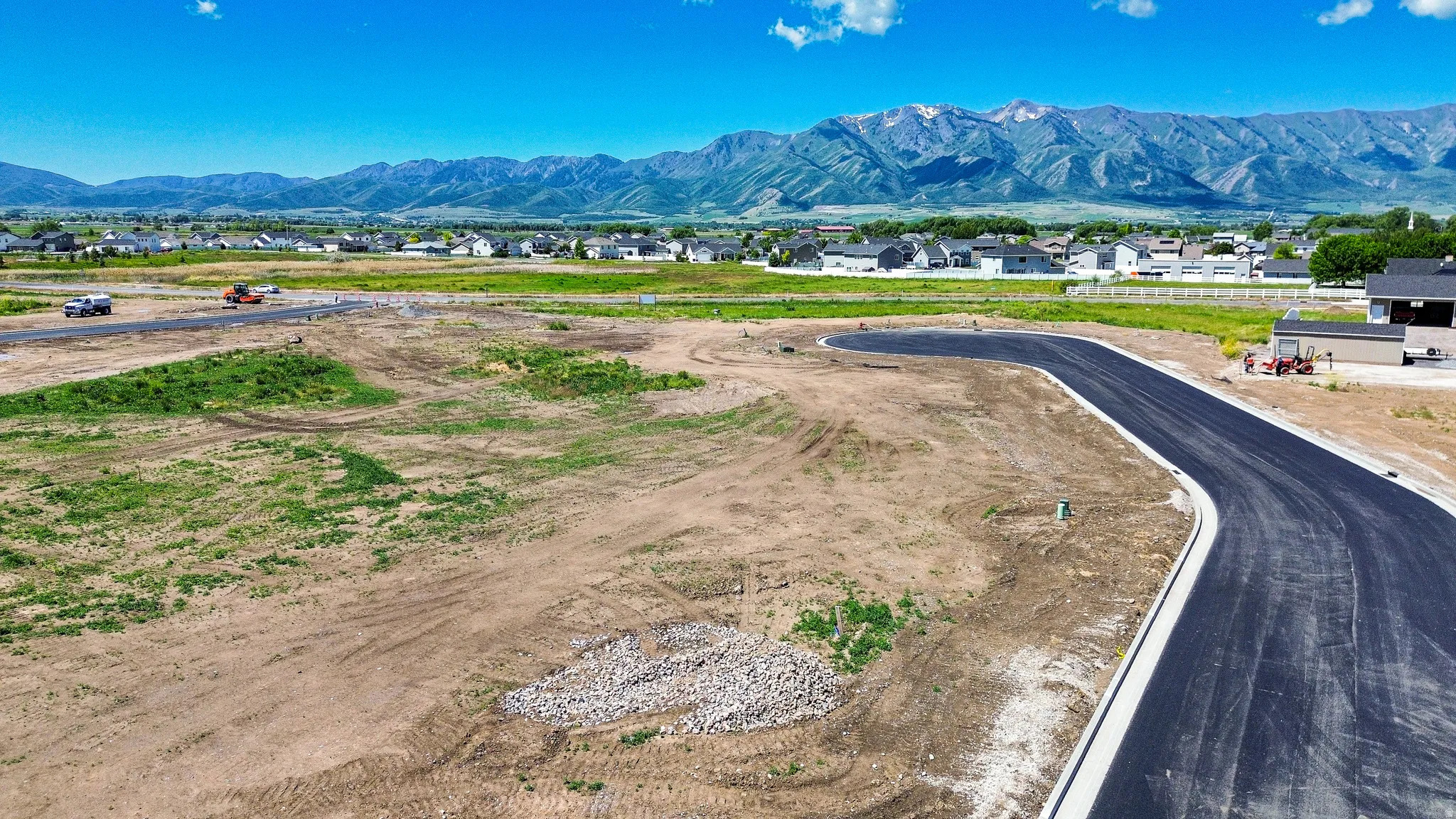Expansive undeveloped lot with partial road frontage
