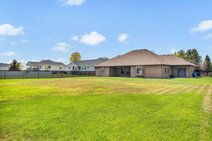 Expansive green lawn providing abundant outdoor space