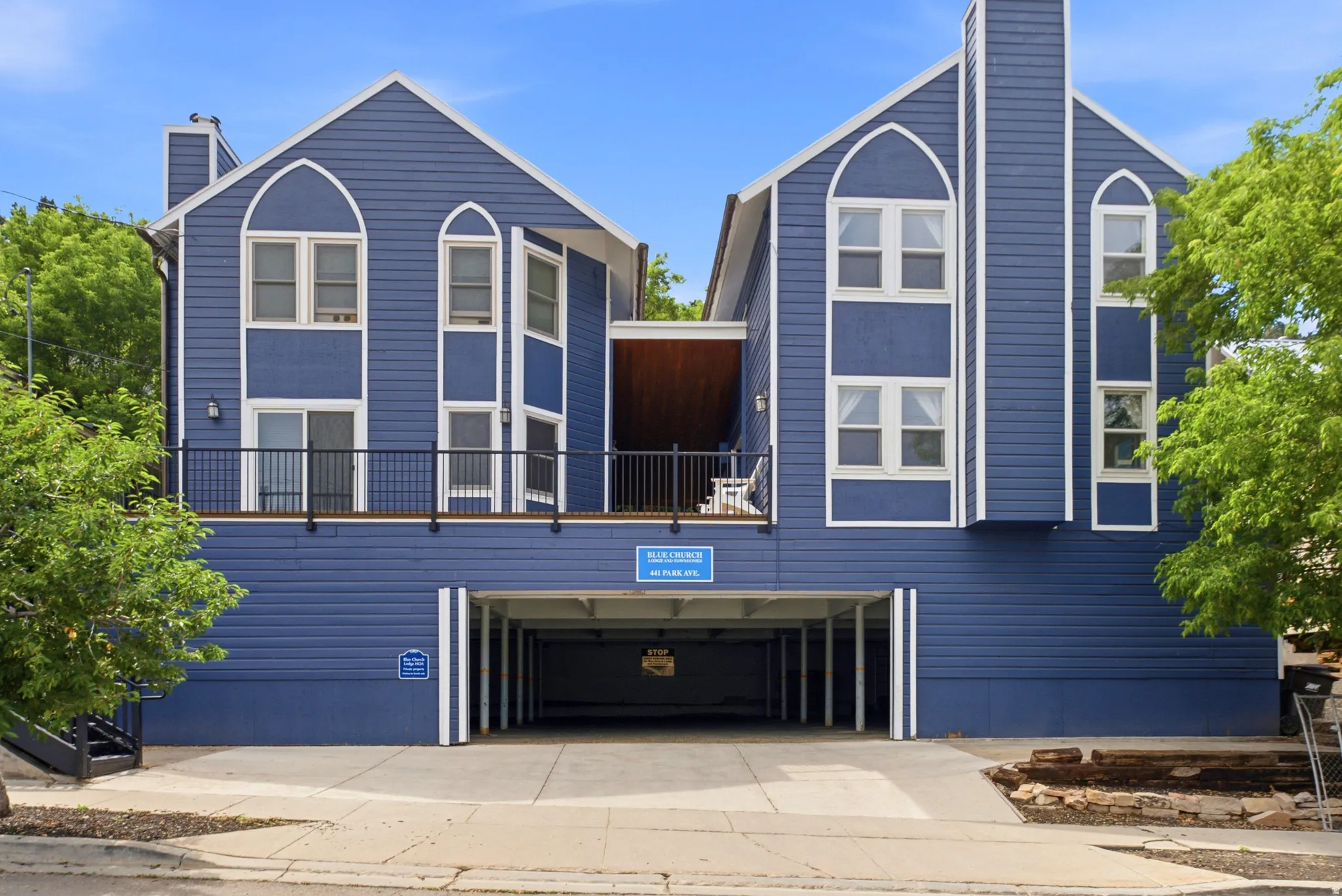 Blue siding exterior with white trim detailing