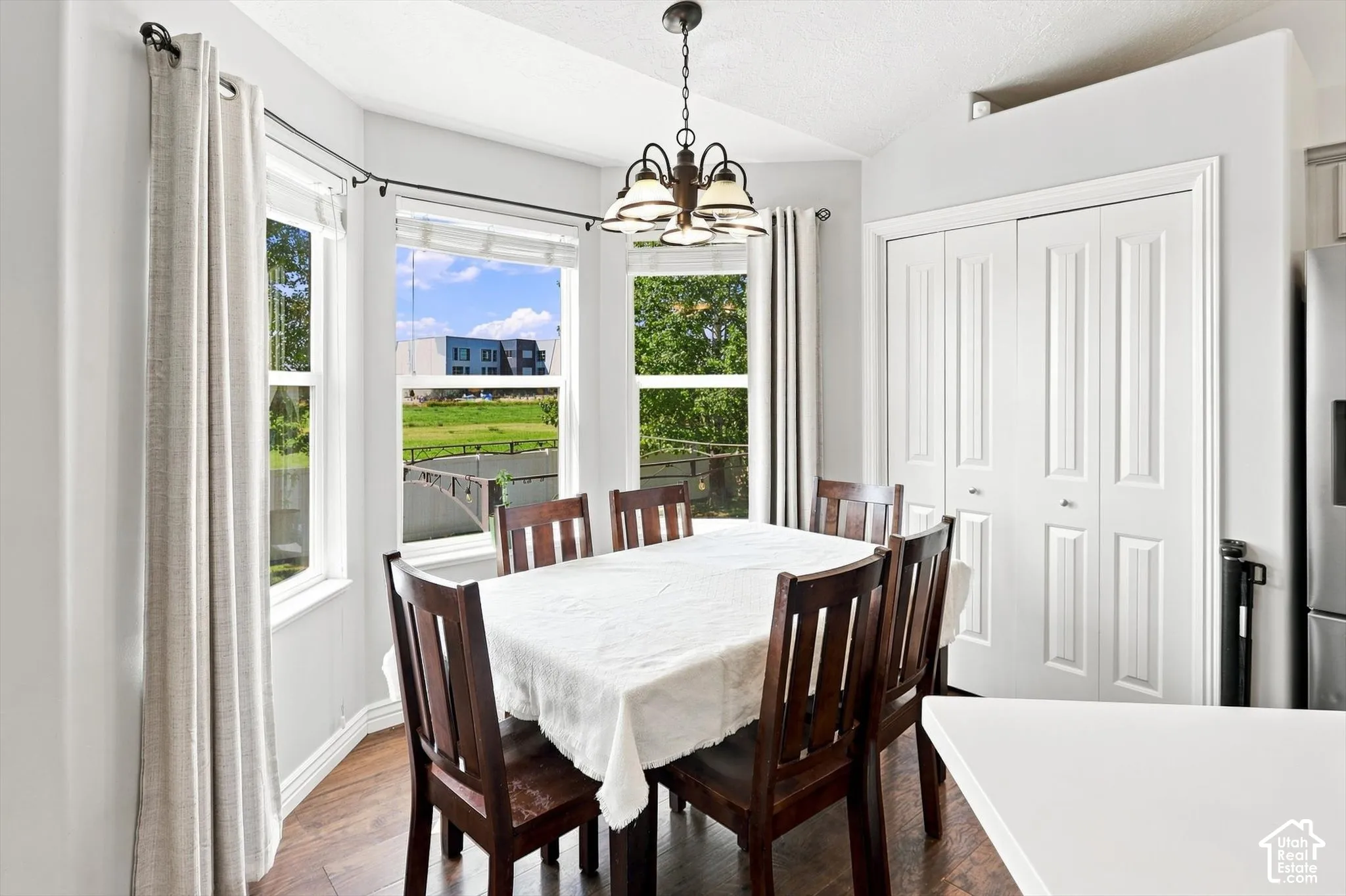 Dining area featuring a bay window with multiple panes