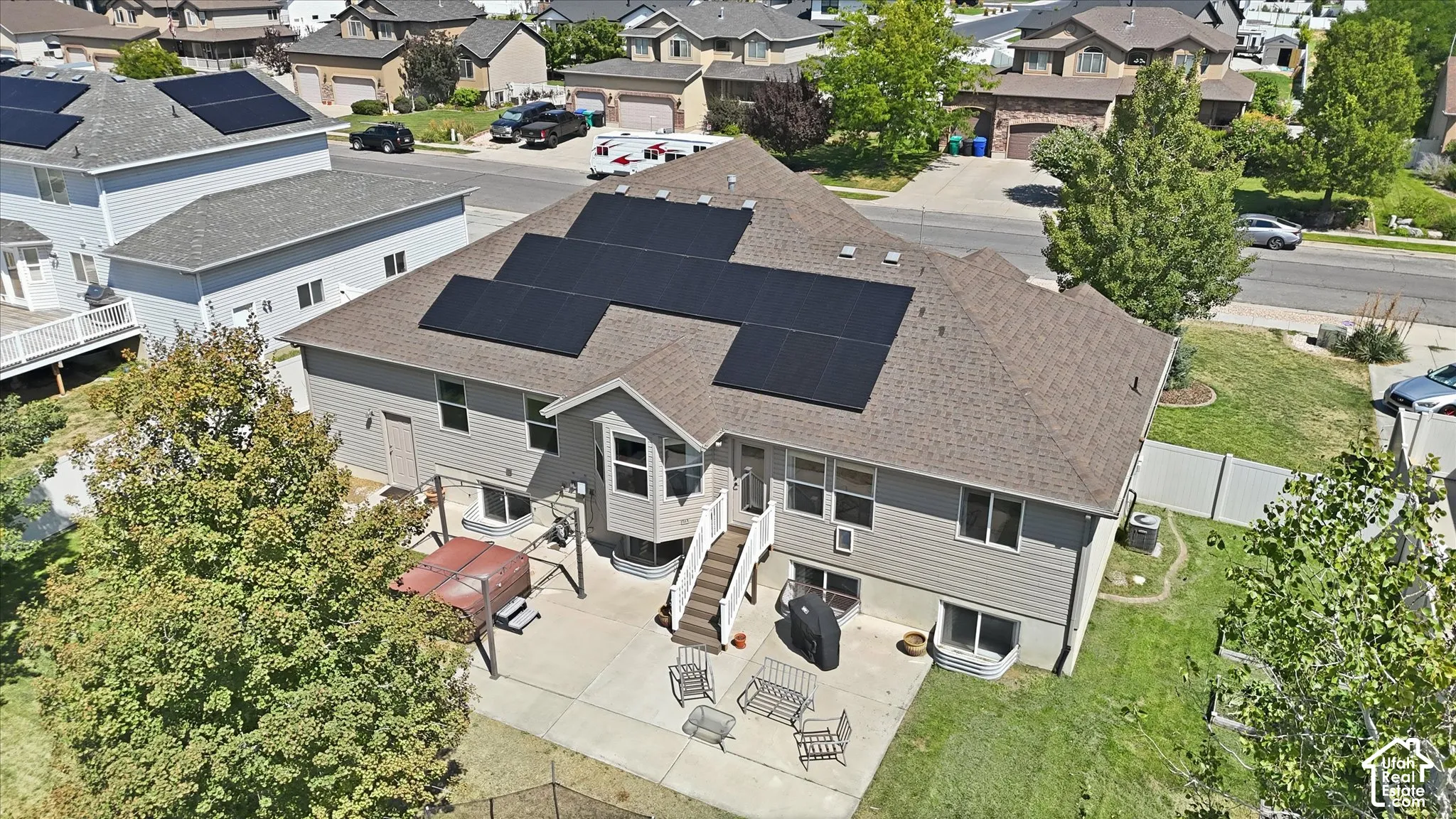 Arial view of home, patio and yard