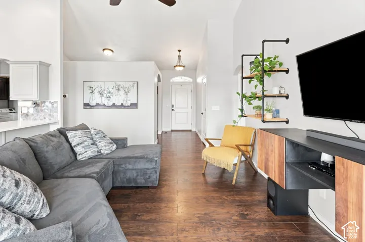 Open-concept living area featuring LVP flooring,