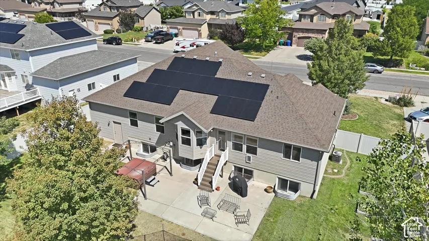 Arial view of home, patio and yard
