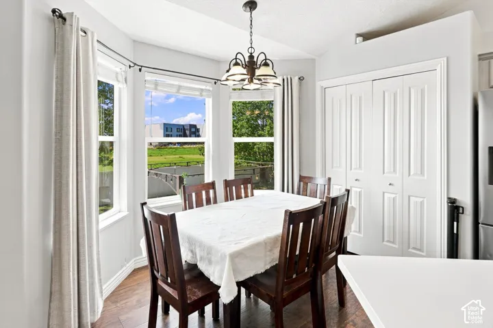 Dining area featuring a bay window with multiple panes