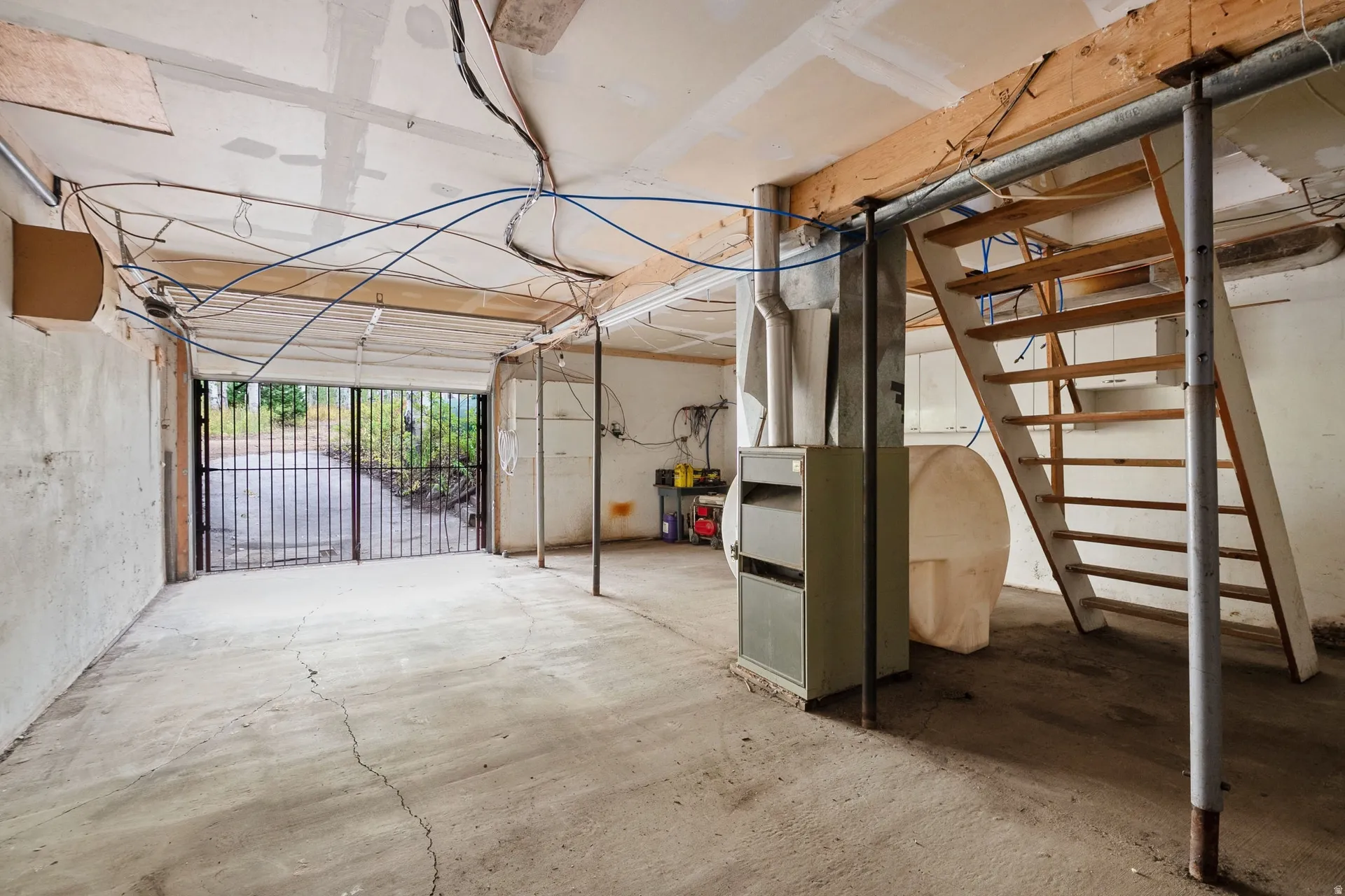 Tandem 2 vehicle plus garage. Plenty of room for storage, wood, equipment and shop.