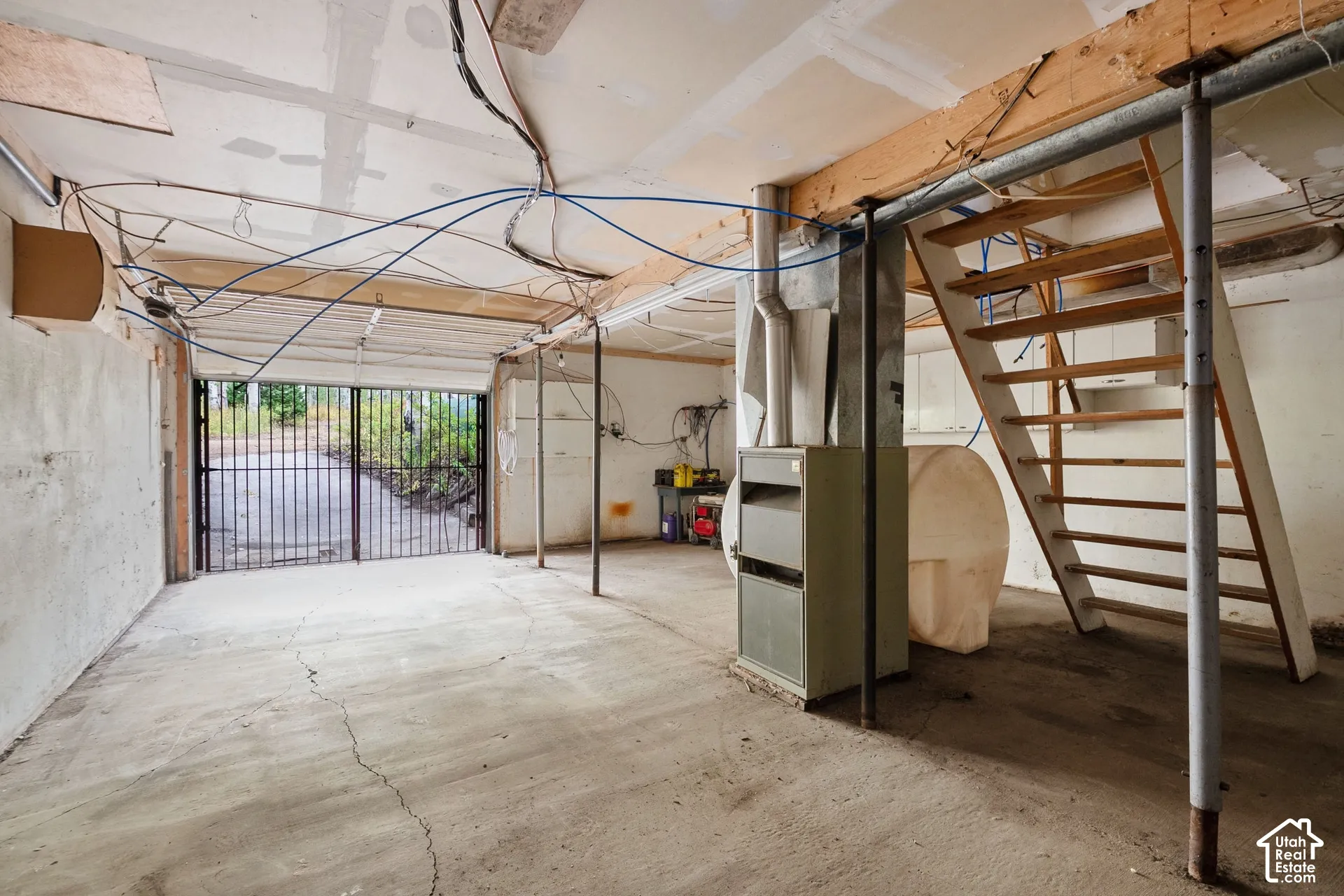 Tandem 2 vehicle plus garage. Plenty of room for storage, wood, equipment and shop.