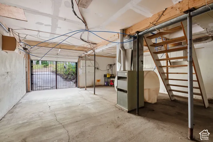 Tandem 2 vehicle plus garage. Plenty of room for storage, wood, equipment and shop.