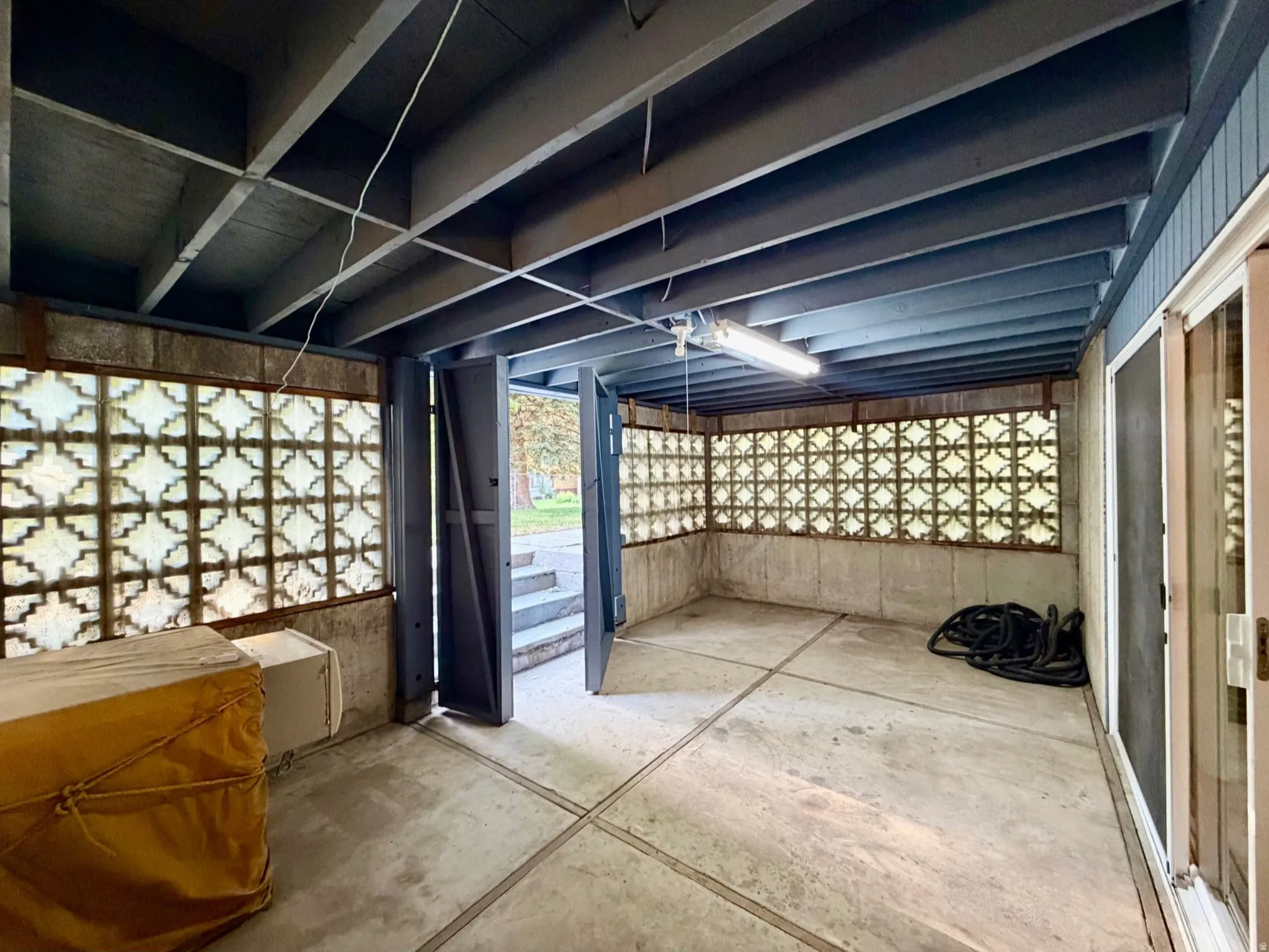Convenient storage area with outside back yard access