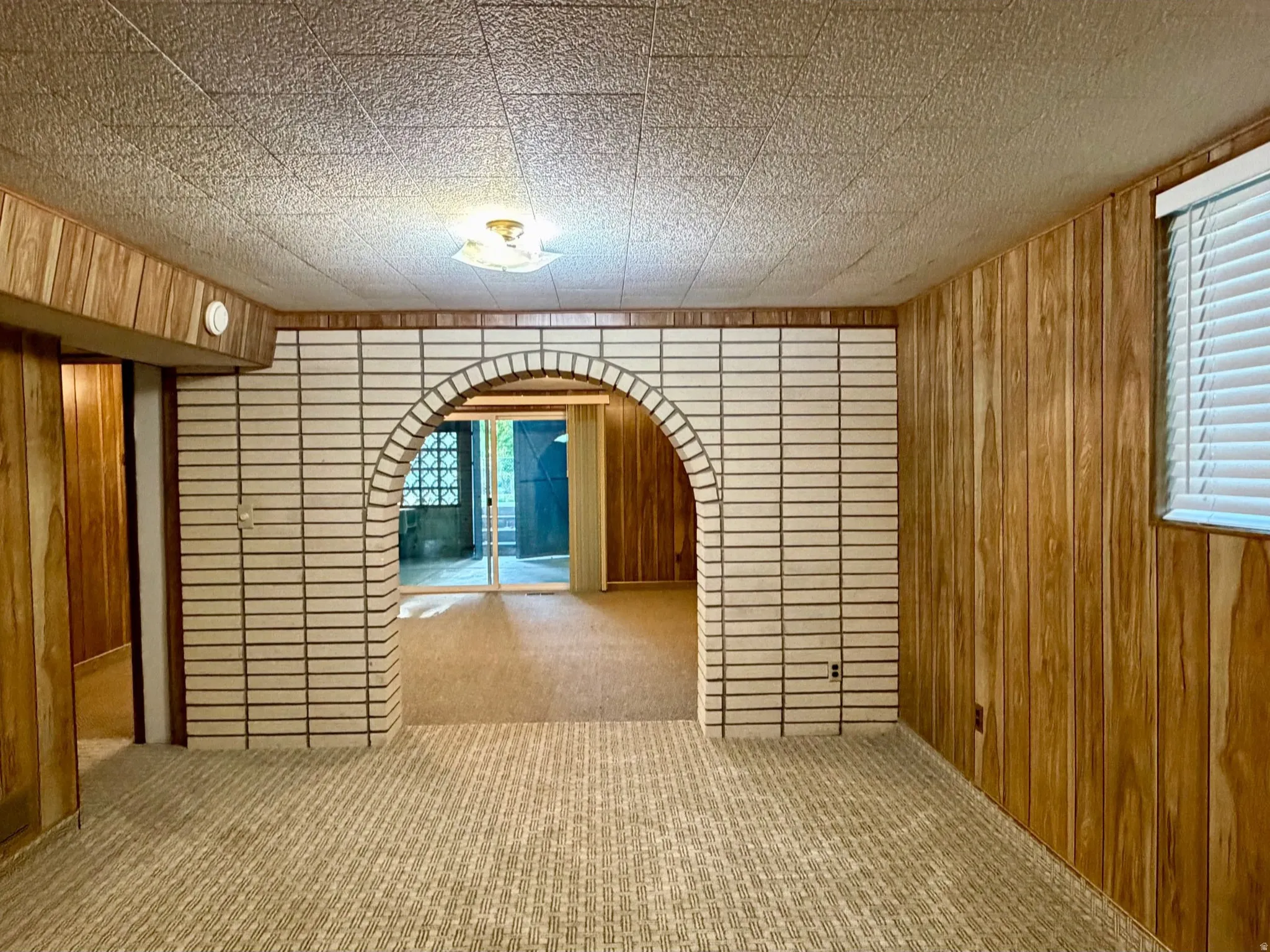 Decorative archway dividing the family room