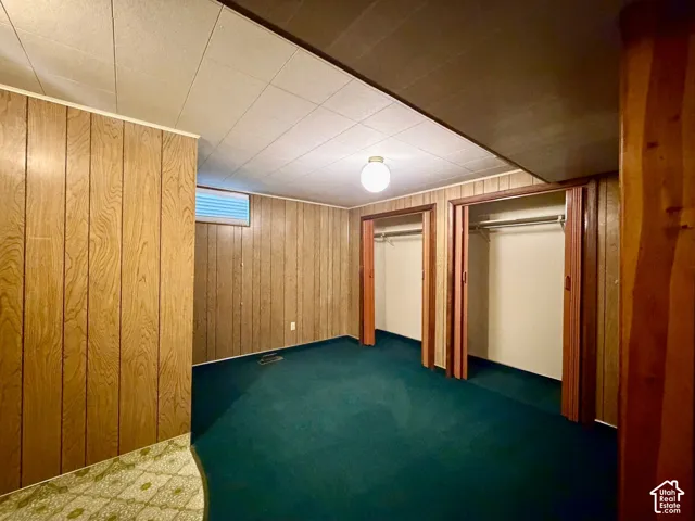 Paneled bedroom with double closets