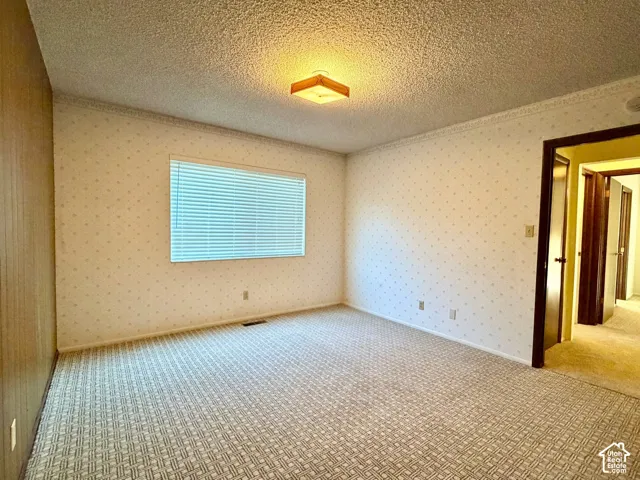 Bright bedroom featuring main floor convenience