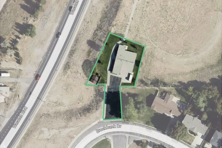Aerial Property Survey. Depicting the property boundaries and structural footprint in relation to surrounding parcels and thoroughfare access