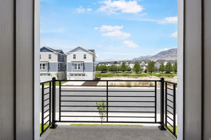 Balcony featuring a black horizontal railing system and concrete flooring