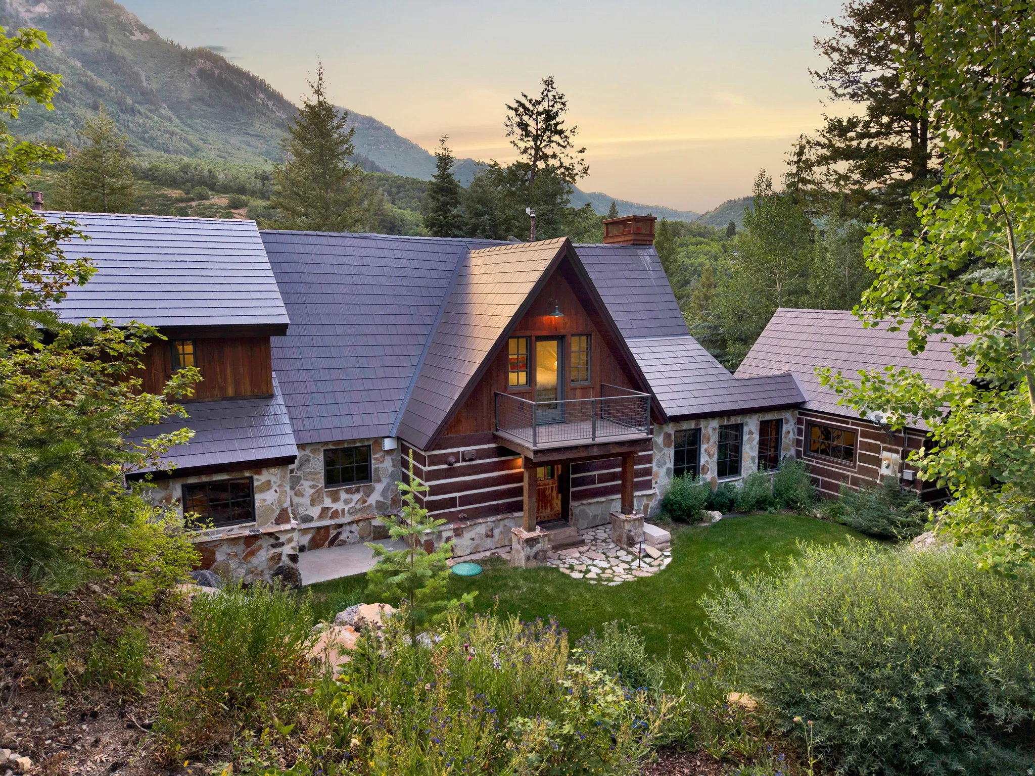 Stone and timber exterior featuring a gable roofline
