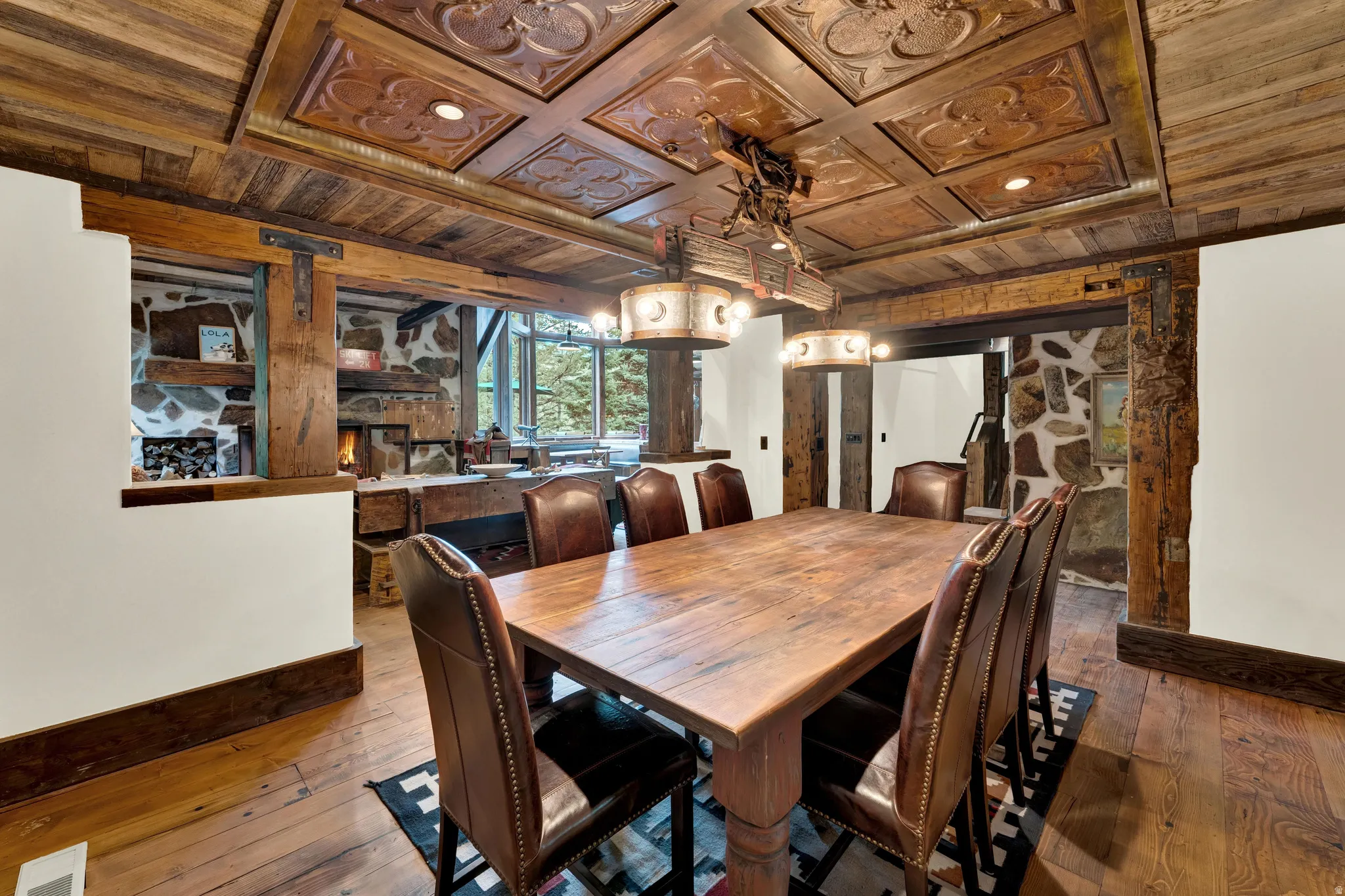 Wood-finish flooring with a textured area rug