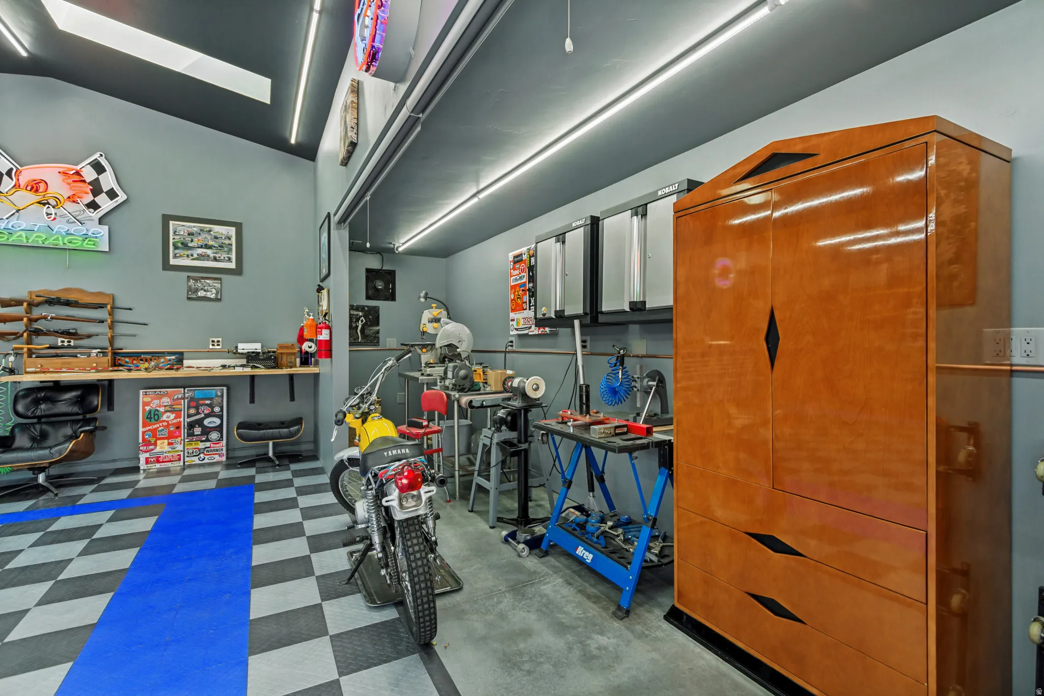 Detached rear Workshop/Garage, approximately 948 sq ft.and features insulated overhead doors, professionally installed copper compressed-air lines around the perimeter, a dedicated ventilated room for grinding and sanding, abundance of electrical outlets.